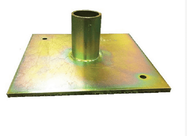 Detailed view of a galvanised scaffold base plate with welded central tubular spigot socket for 48.3mm scaffold tubes, square steel base with nail holes for sole board attachment.
