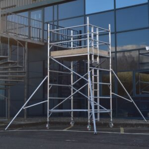 HiLyte500 double width industrial scaffold tower with 1.8m length and 1.45m wide platform, adjustable heights from 1.2m to 12.2m, featuring aluminium frame, guardrails, stabilisers, and castors for safe mobile access on construction sites