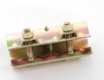 Close-up of zinc-plated pressed steel scaffold sleeve coupler featuring two hex bolts and central slot for alignment on 48.3mm tube
