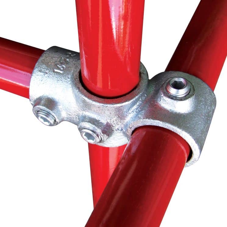 Close-up view of a galvanised Q Clamp Combination Socket Tee and Crossover (model 165-4) securely connecting three red-painted steel tubes at right angles. The clamp features a socket design on one side and a crossover tee on the other, with visible hex set screws tightened onto the tubes for a firm, slip-resistant joint. Ideal for racking, shelving, or structural frameworks using 48.3mm diameter tubing.